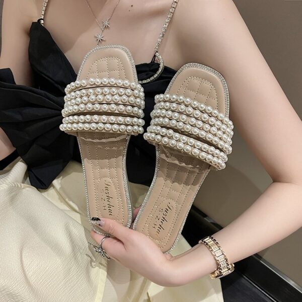 Small Chanel style pearl flip flops
